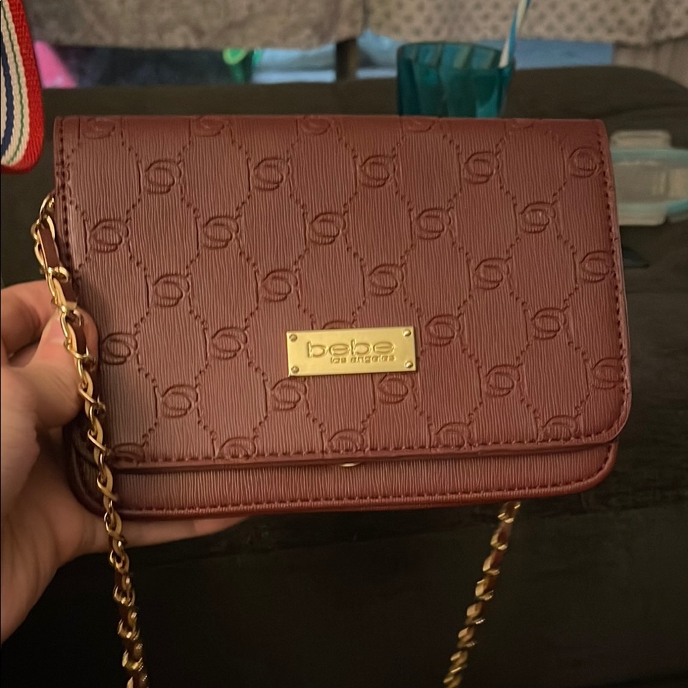 Bebe Gold and Red Crossbody Bag with Luxurious Embossed Design